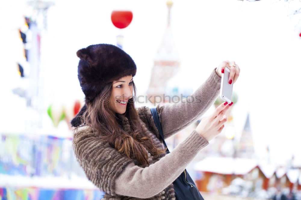 Similar – Woman smelling flower on market