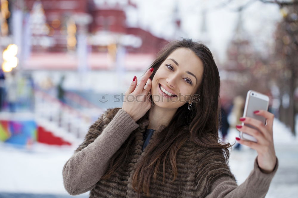 Similar – Image, Stock Photo Happy young woman with her mobile on the street