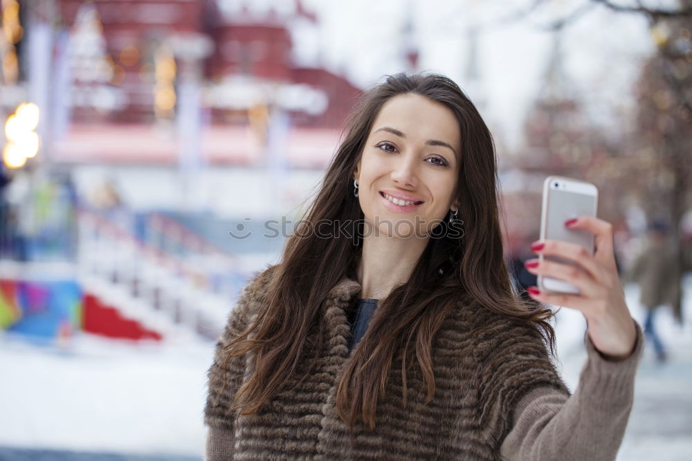 Similar – Stylish Woman Taking Selfie at the City Street