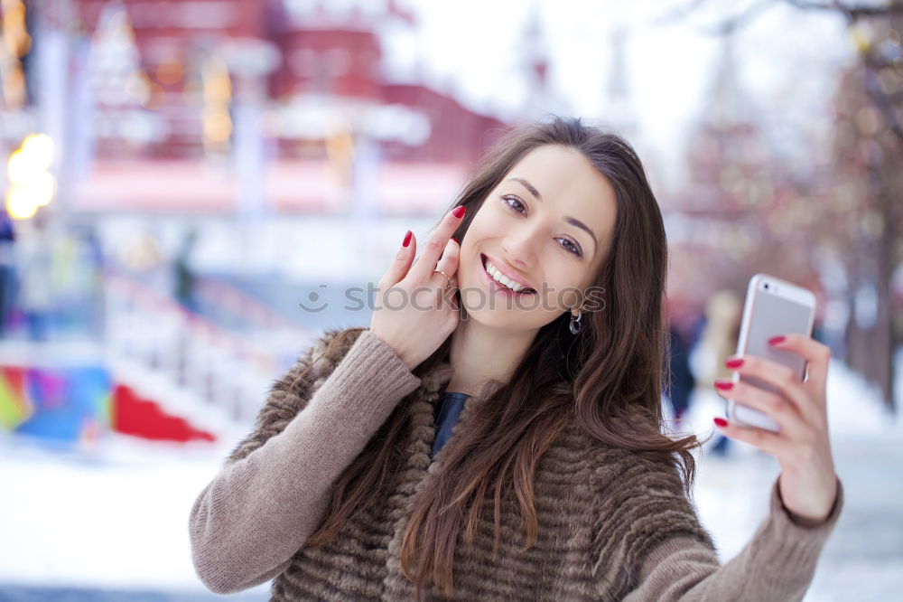 Similar – Stylish Woman Taking Selfie at the City Street