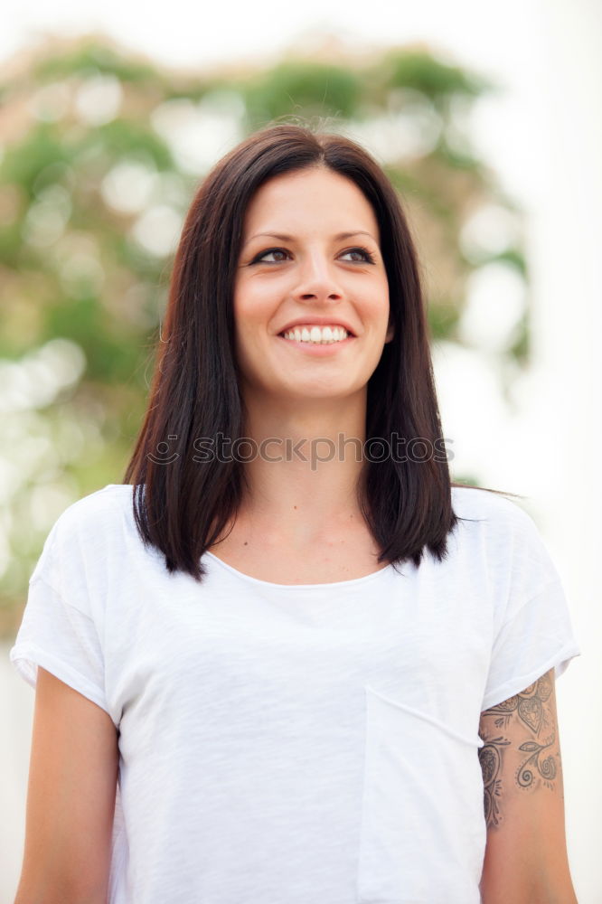 Portrait of a beautiful happy woman outdoors