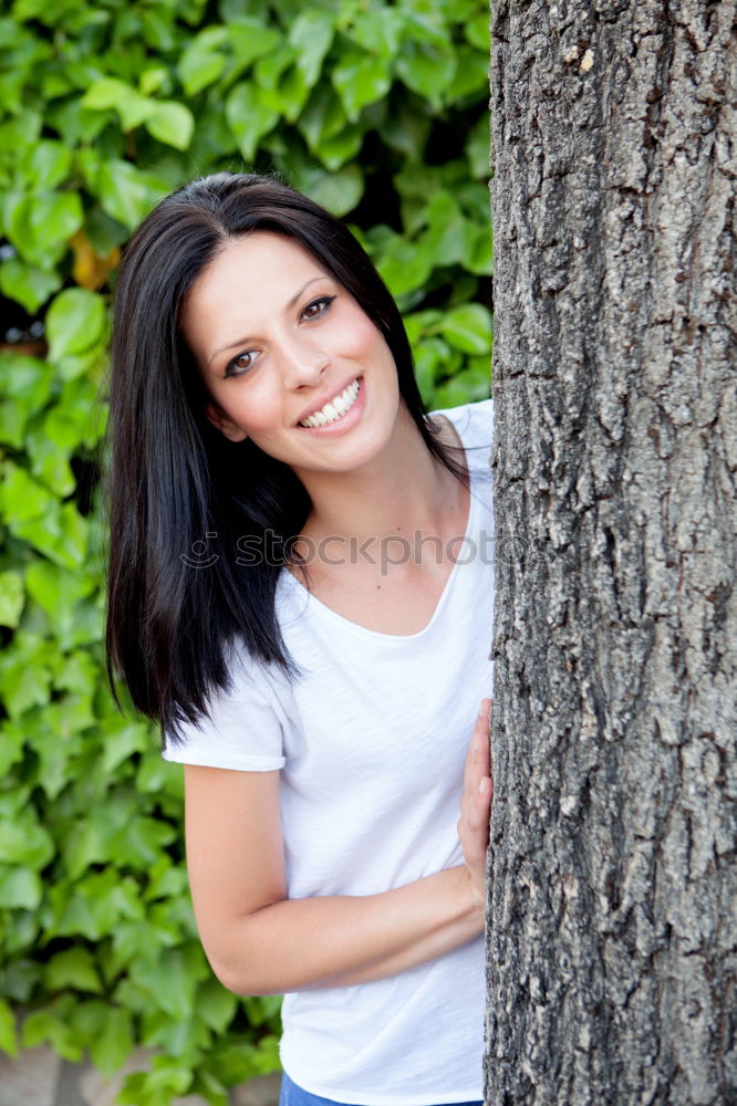 Similar – Image, Stock Photo Beautiful brunette in white on green