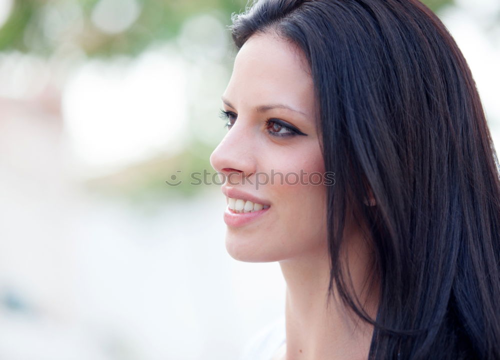 Similar – Young woman wearing casual clothes smiling in urban background