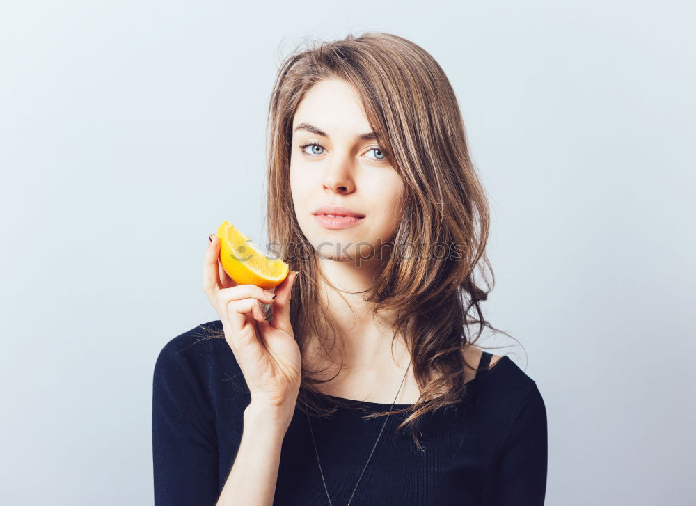 Similar – Image, Stock Photo An apple a day … Young woman eating an apple with relish