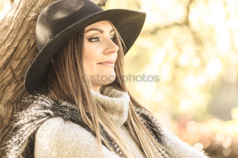 Similar – Image, Stock Photo Smiling blond woman with hat in urban background