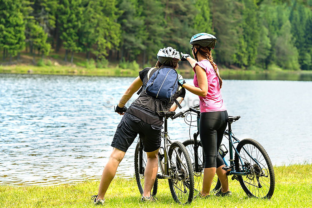 Similar – Image, Stock Photo Women with bikes taking a selfie