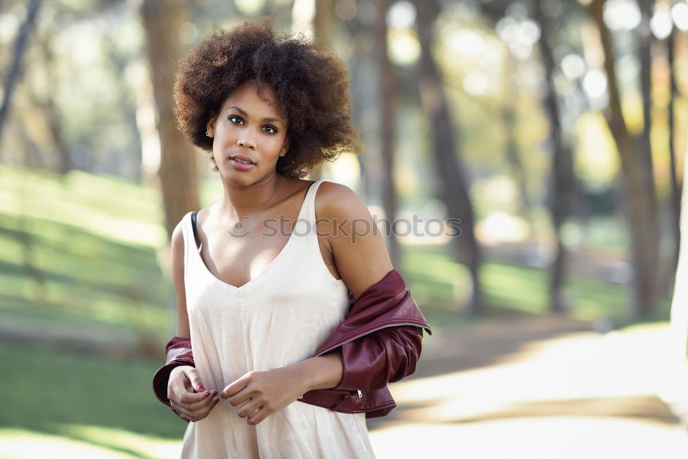 beautiful afroamerican woman using mobile phone