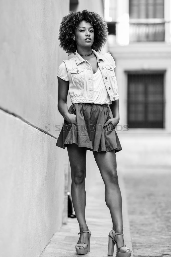 Similar – Image, Stock Photo Young black woman, afro hairstyle, standing in the street