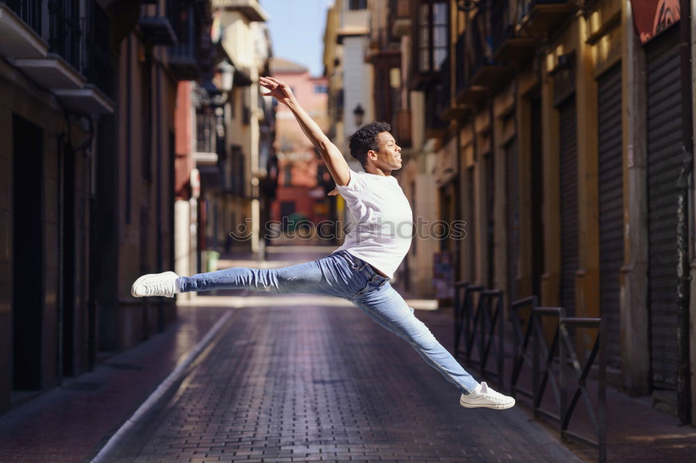 Similar – Image, Stock Photo Young happy woman jumping in the street