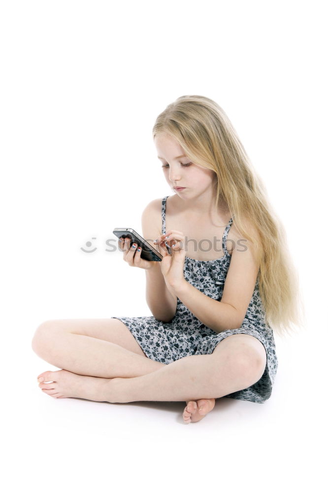 Similar – Image, Stock Photo portrait of a beautiful kid using mobile phone