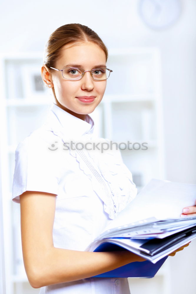 Similar – Female cosmetician applying a facial mask with special cosmetic brush. Beautiful cosmetician looking to the camera