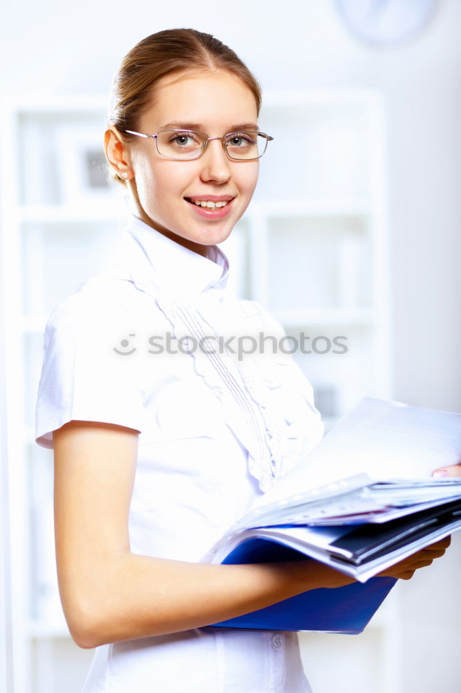 Similar – Female cosmetician applying a facial mask with special cosmetic brush. Beautiful cosmetician looking to the camera