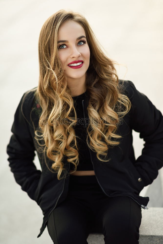 Similar – Image, Stock Photo Portrait of young woman smiling in urban background