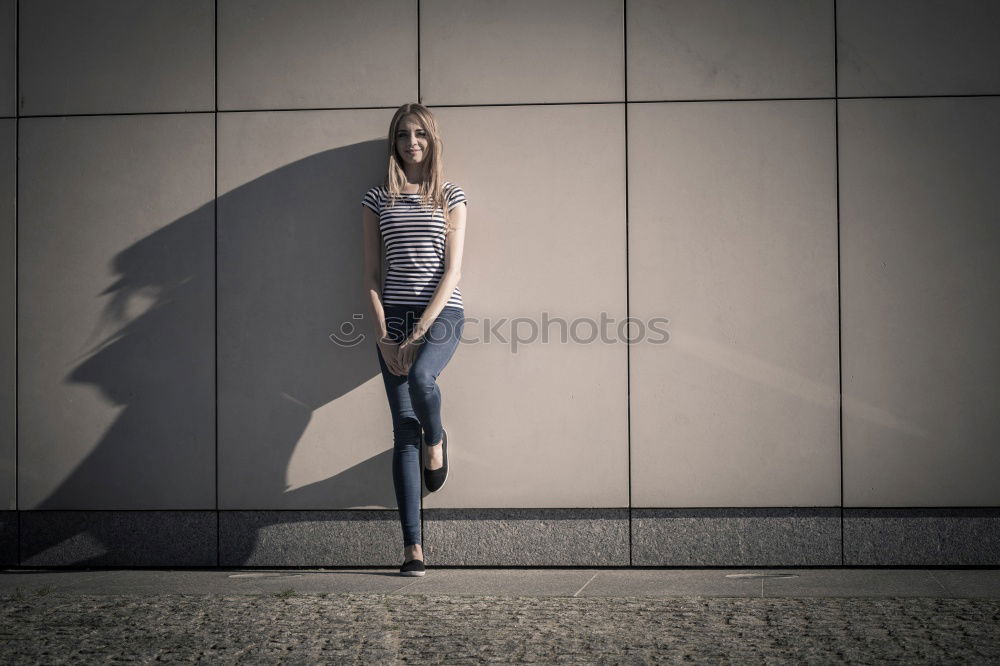 Similar – Trendy girl posing on stairs