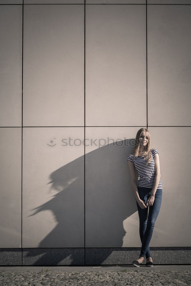 Similar – Trendy girl posing on stairs