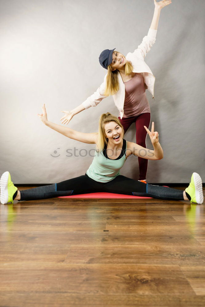 Similar – Young funny couple enjoying and doing a handstand