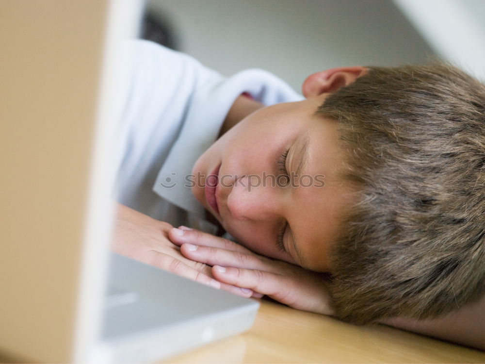 Similar – Image, Stock Photo little boy is lying on the bed and reading a book at the day time