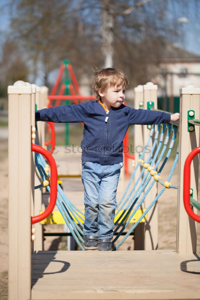 Similar – Child in a playground Girl