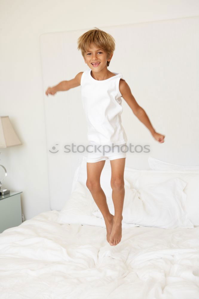 Similar – beautiful kid girl jumping on bed