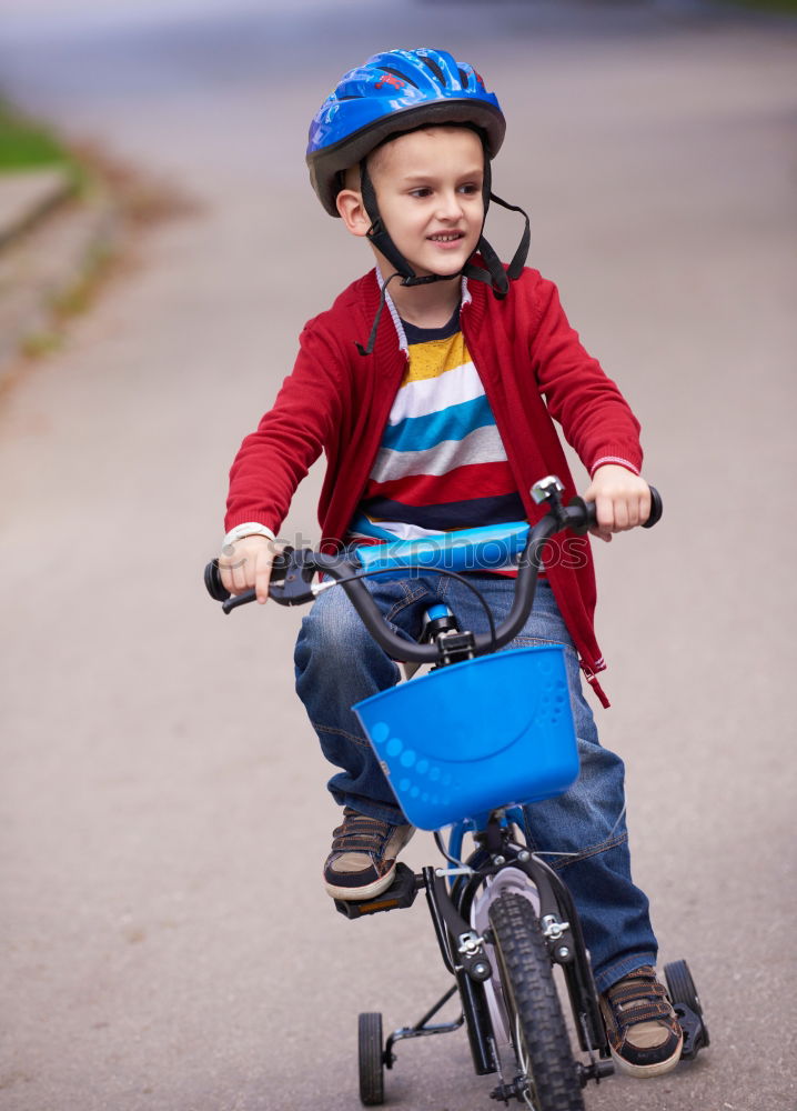 Similar – Five year old child with scooter in the park