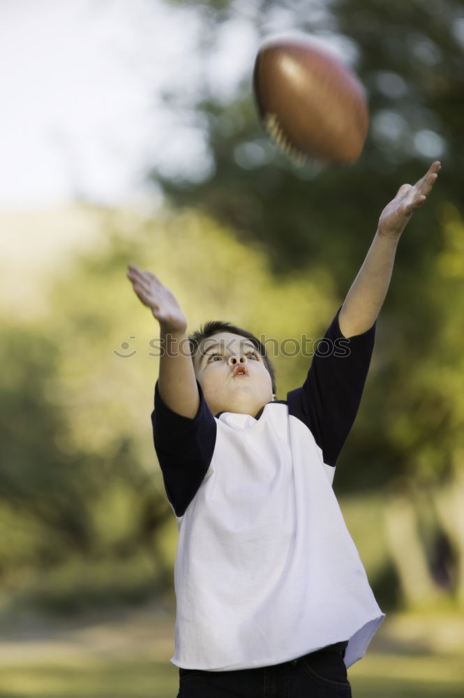 Similar – junge langhaarige Frau hält einen Basketball gegen grüne Wand