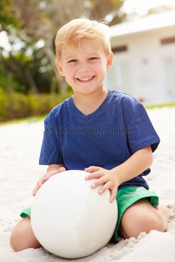 Similar – Portrait of a young boy with soccer ball. Concept of sport.