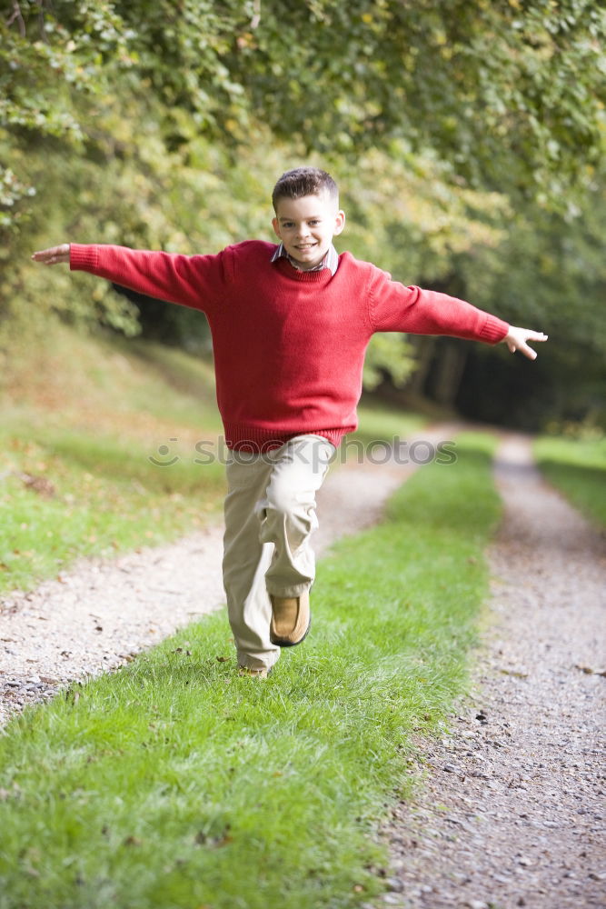 Similar – Junge springt auf einem Trampolin