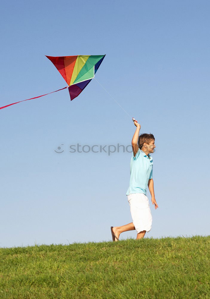 Similar – Image, Stock Photo Two little kids playing with cardboard toy airplane in the park at the day time. Concept of happy game. Child having fun outdoors. Picture made on the background of blue sky.