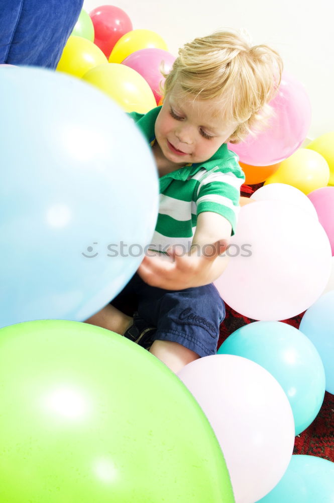 Similar – Image, Stock Photo Child in ball pool Playing