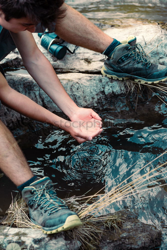 Similar – Image, Stock Photo Barefoot man walking on puddle