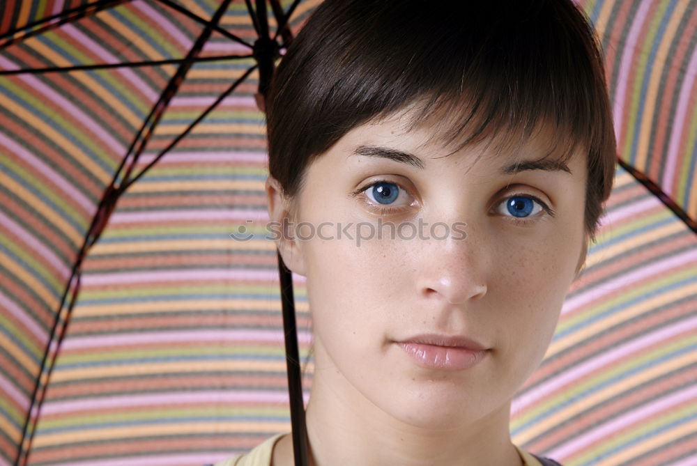 Similar – Young woman with red umbrella red nails and red lipstick