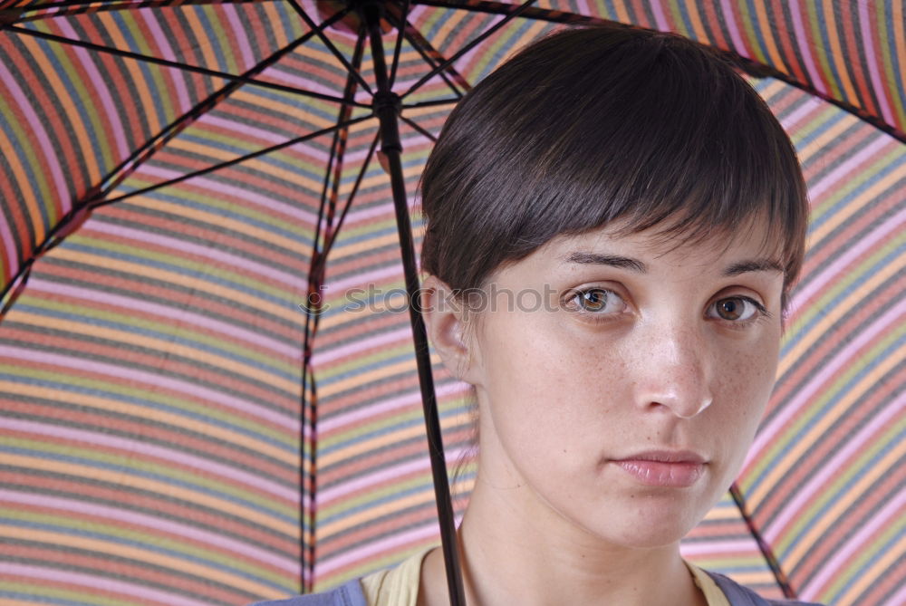 Similar – Young woman with red umbrella red nails and red lipstick