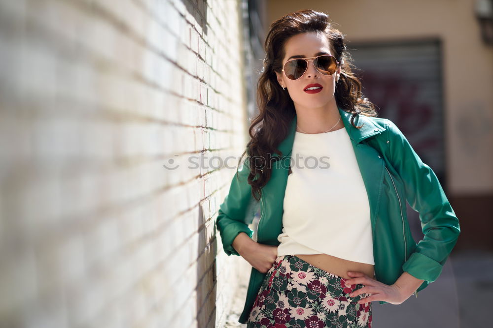 Image, Stock Photo Woman with aviator sunglasses next to a brick wall