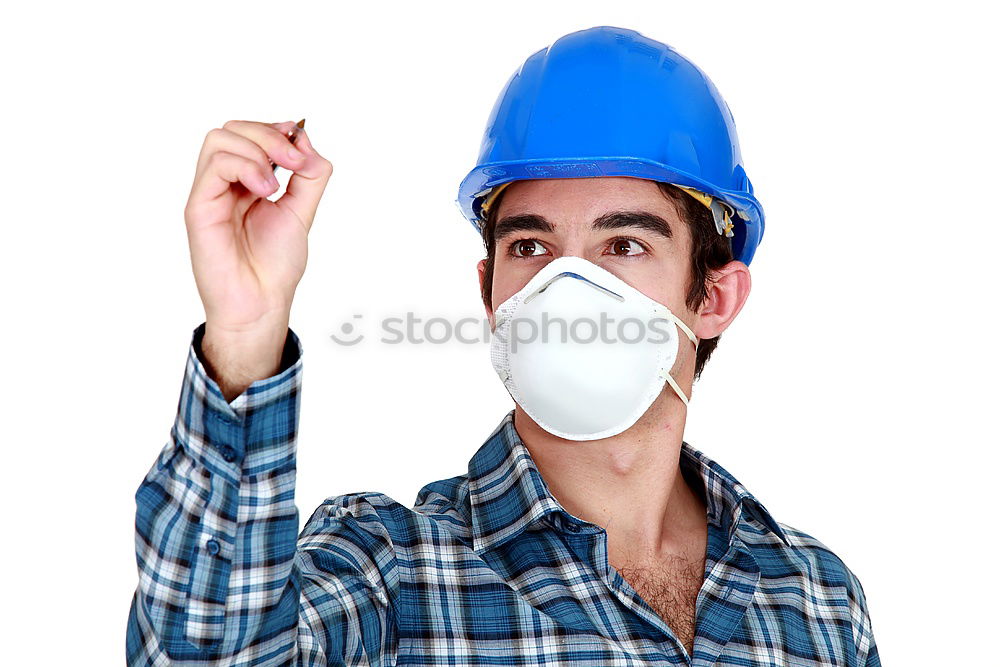 Similar – Workman in protective mask and glasses standing on street