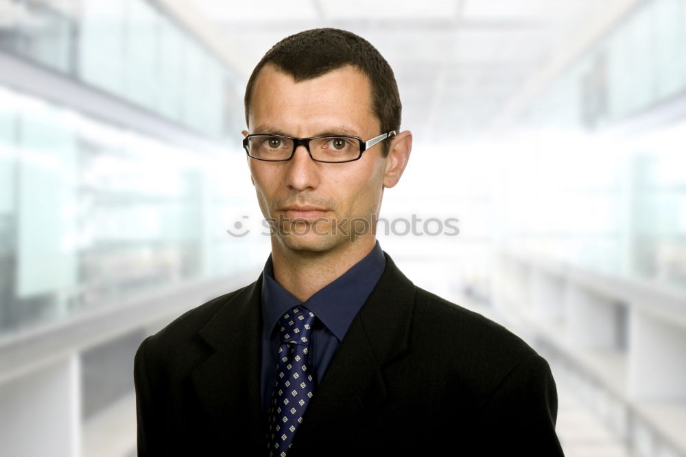 Similar – Determined man with glasses