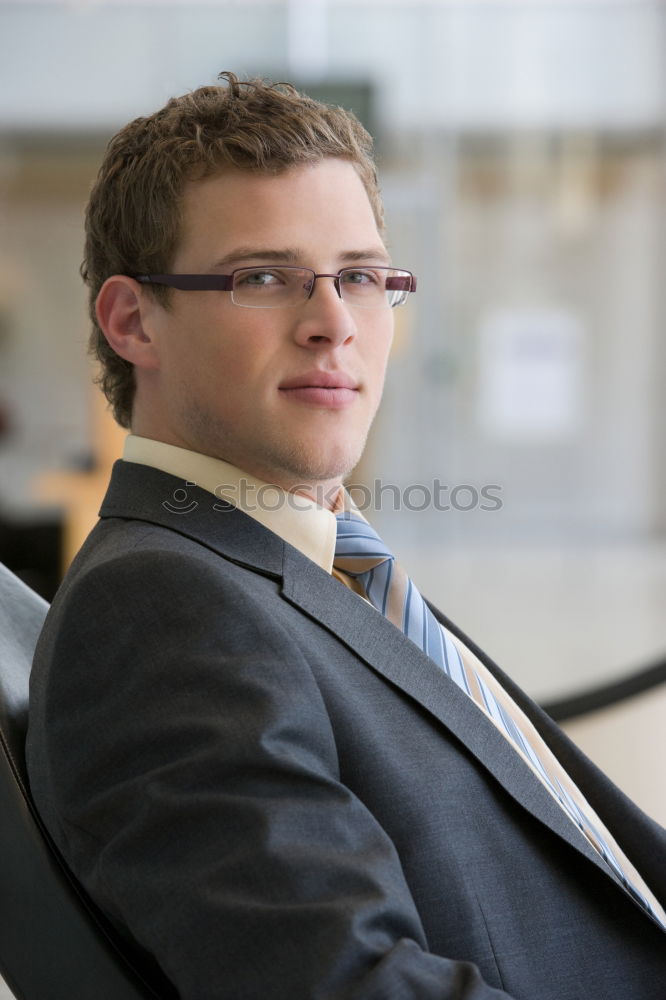 Similar – Businessman in urban background wearing blue suit