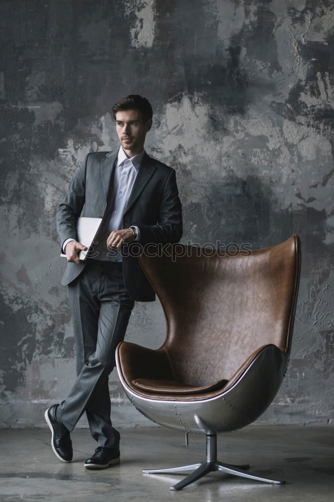 Similar – Image, Stock Photo Senior businessman walking outside of modern office building.