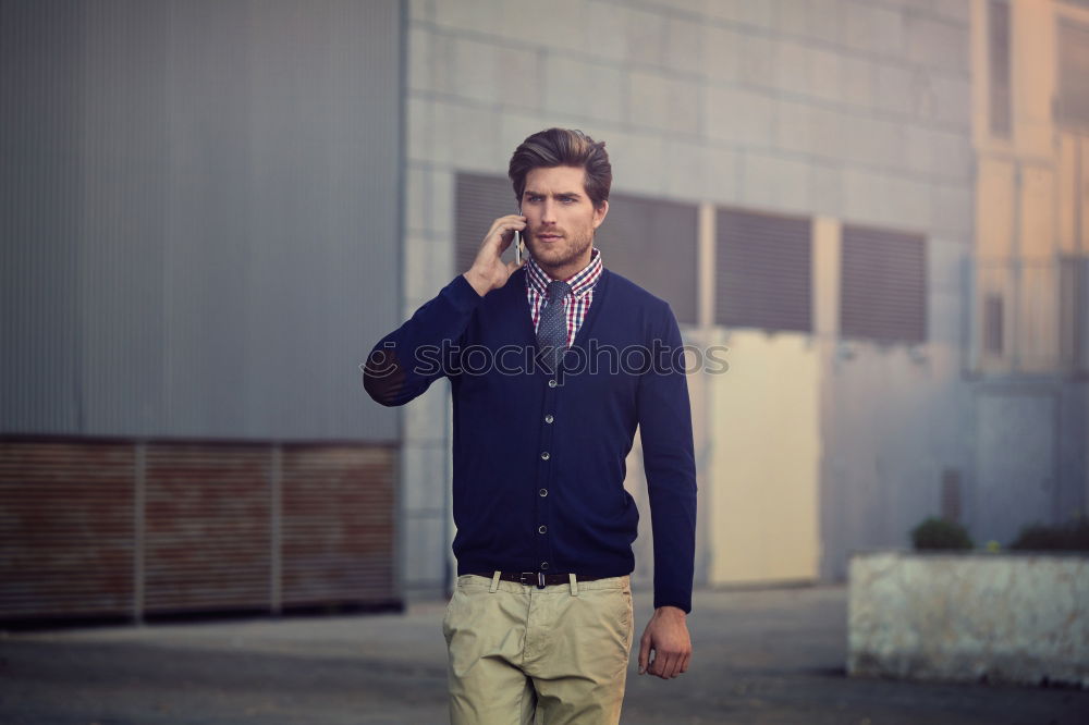 Similar – Young bearded man, model of fashion, sitting on urban step