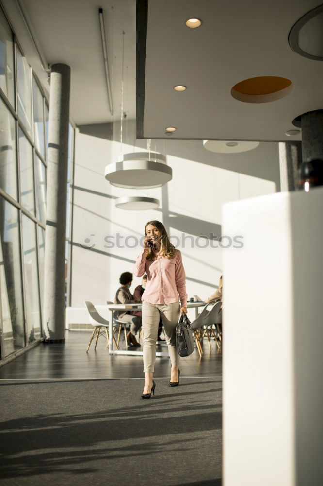 Similar – Image, Stock Photo man front walking at the airport using mobile phone