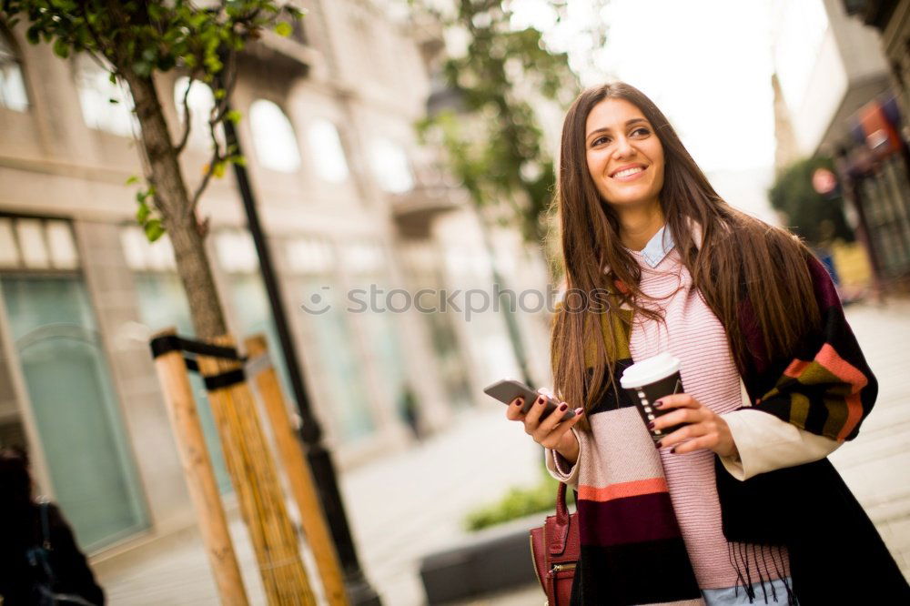 Similar – Stylish Woman Taking Selfie at the City Street