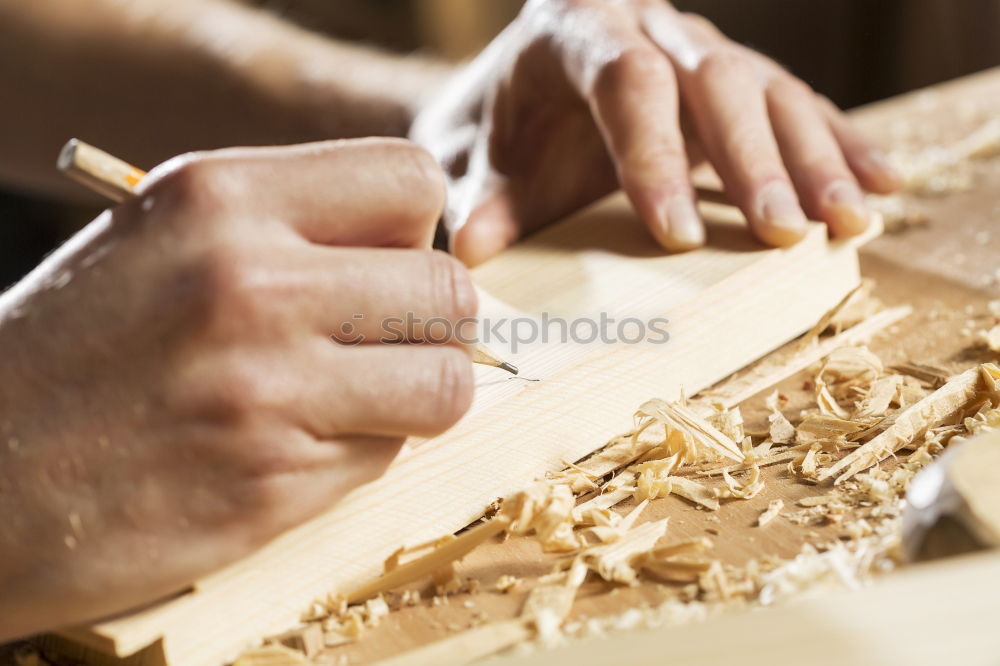 Similar – Craftsman working in his workshop wooden boxes