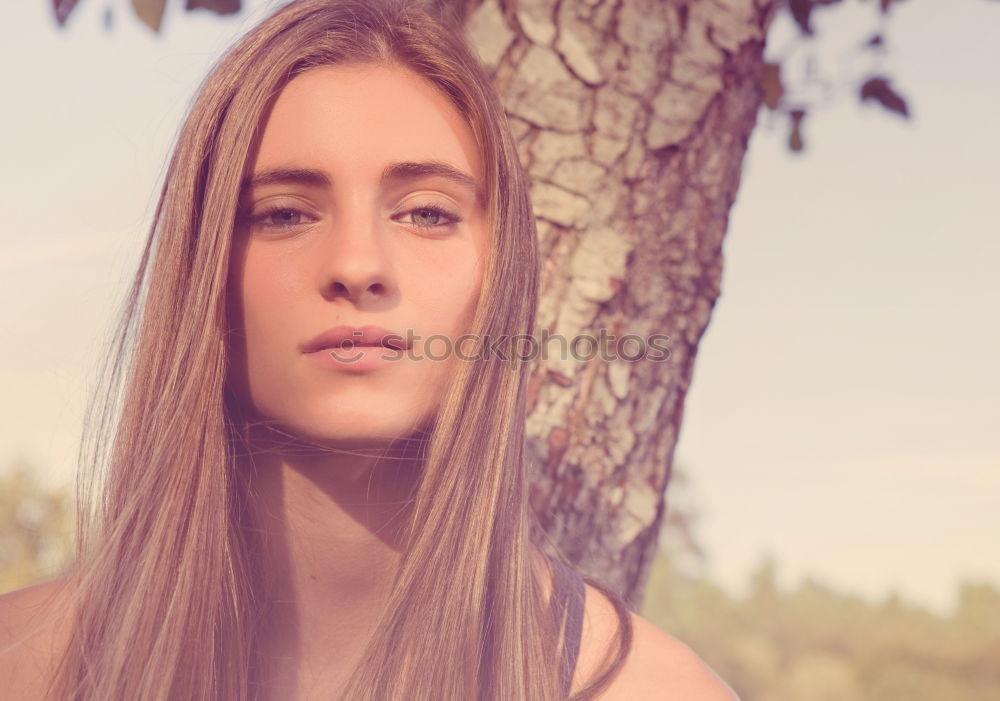 Similar – Image, Stock Photo teenager with hoodie leaning against a tractor tire