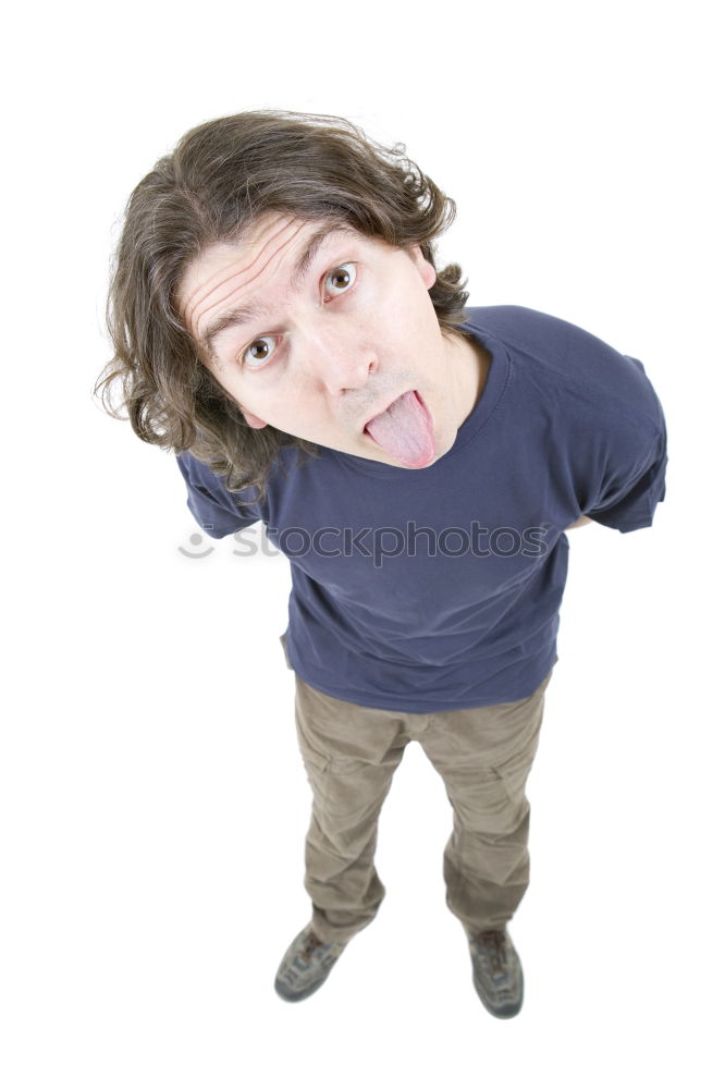 Image, Stock Photo funny child with colored pencil in the mouth against brick background