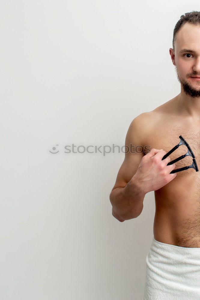 Similar – Young man applying shaving cream