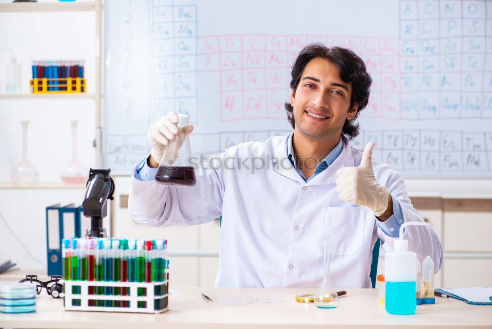 Similar – Image, Stock Photo Young man in lab