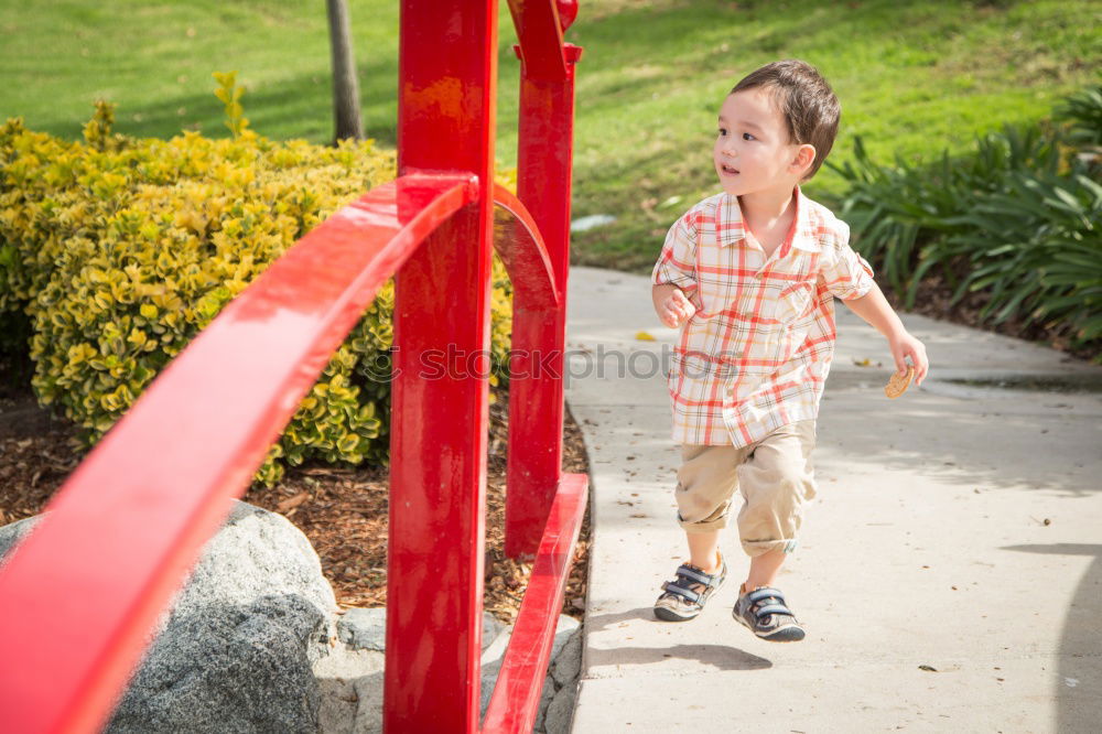 Similar – Red slide Human being