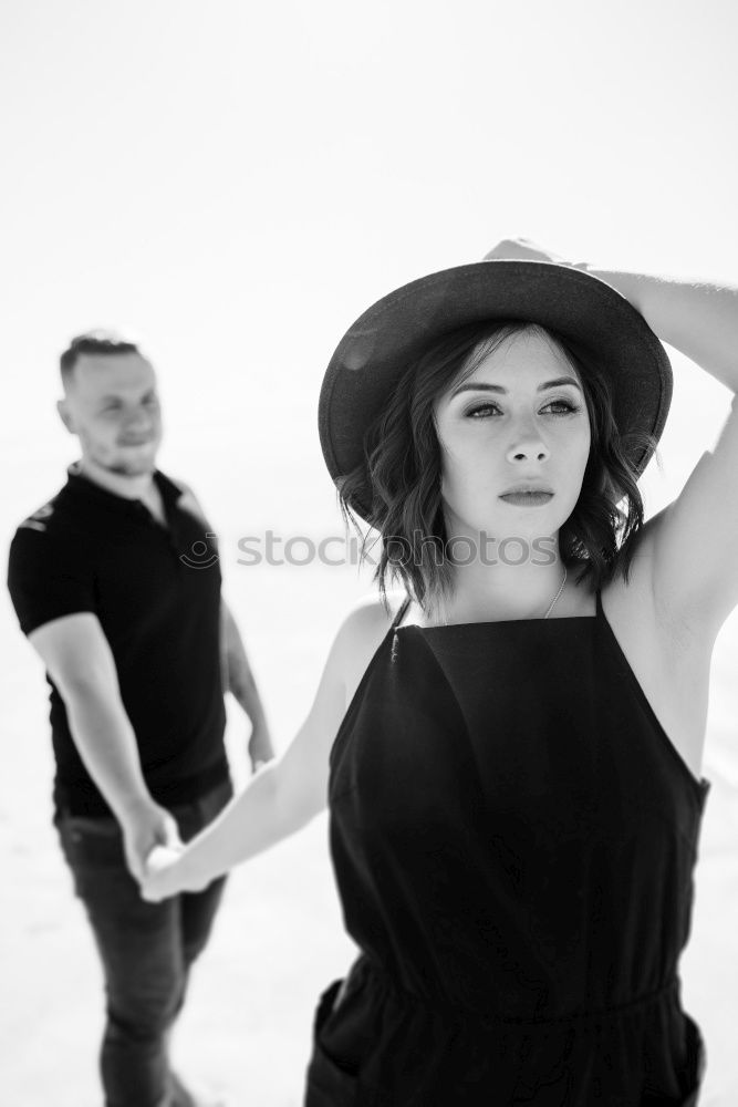 Similar – Image, Stock Photo Alternative couple black and white outdoors portrait.