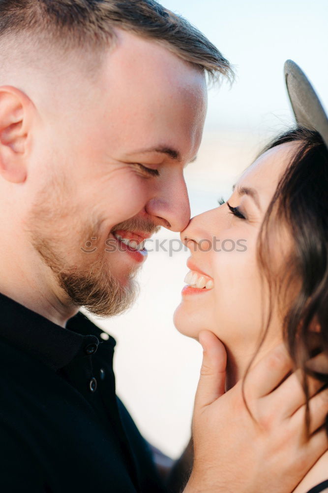 Similar – Image, Stock Photo Happy couple hugging and kissing near tree in park