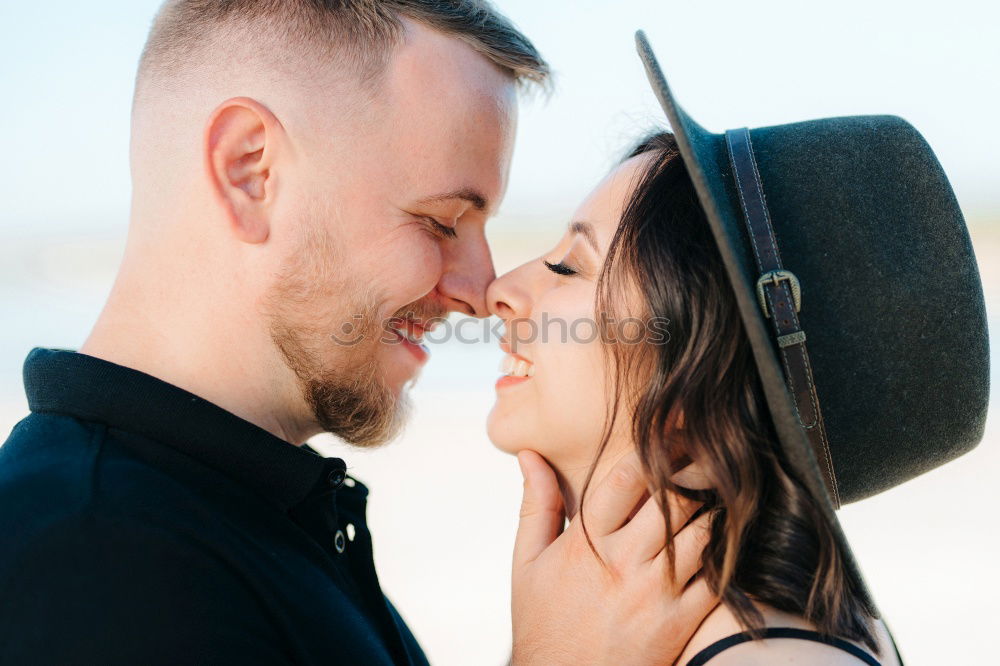 Similar – Image, Stock Photo Happy couple hugging and kissing near tree in park