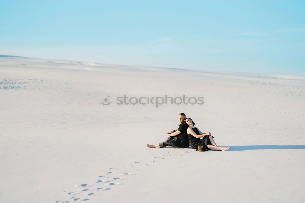 Similar – Image, Stock Photo Couple of climbers walking with crash pads at the coast